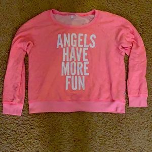 Pink Victoria’s Secret sweater in size medium.